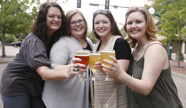 JXN Barley’s Angels, which includes (left to right) Heather Collette, Charlene Williams, Toni Francis, who started the Jackson chapter, and Shanna Head, hopes to educate women on craft beer and create spaces to have a good time while supporting local breweries.