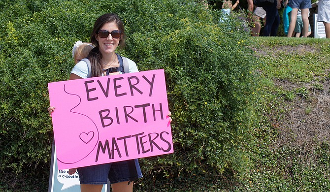 Carrie Huhn helped coordinate an Improving Birth rally in Jackson, on Sept. 12 in front of Duling Hall, hoping to educate moms and soon-to-be momks about their options and staying healthy during pregnancy.