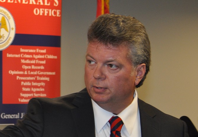 Attorney General Jim Hood said that district attorneys and county attorneys can prosecute campaign-finance disclosure violations, which are misdemeanors. Trip Burns/File Photo