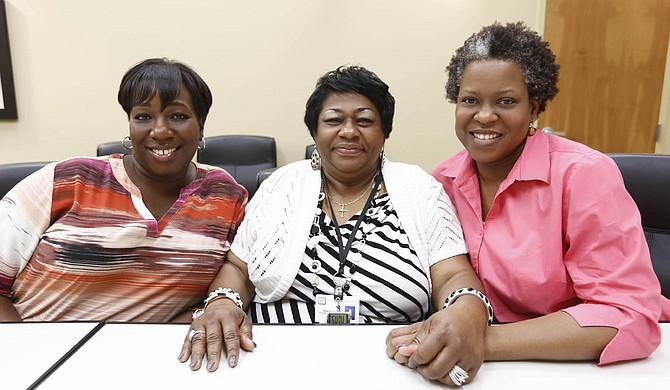 Rhonda Davis, Willie Mae Berry and Talya Straughter (left to right) make up a part of the 170-person team at Hinds Behavioral Health Services.