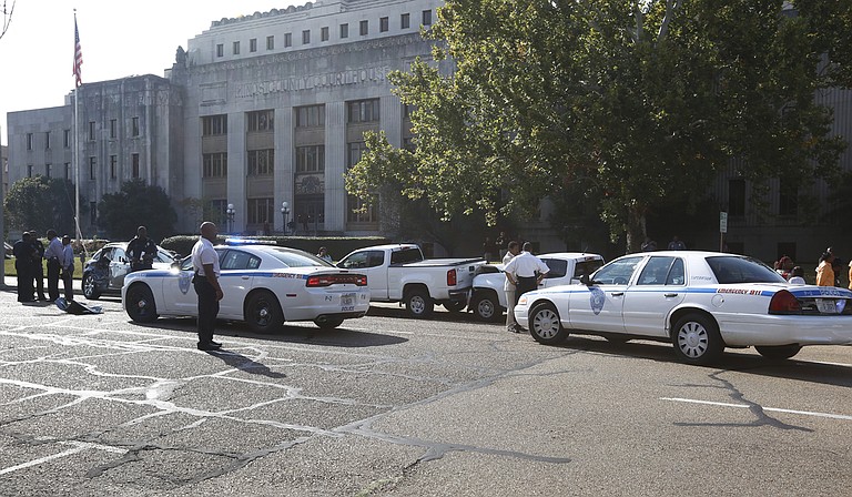 A suspected domestic-violence situation prompted a high-speed police chased that ended with a six-car collision in downtown Jackson.