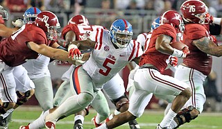 After suffering a concussion while playing offense during the University of Mississippi’s game against the University of Memphis, Rebels defensive tackle Robert Nkemdiche, who had been playing both sides of the ball, probably won’t be returning to offense. Photo courtesy University of Mississippi Athletics