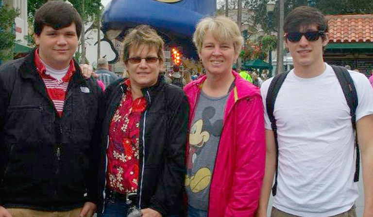 Lauren Czekala-Chatham (second from left) pictured with her partner, Dawn Miller, and two sons Aaron Chatham (far left) and Alec Chatham (far right) at DisneyWorld in Orlando in 2013. Photo courtesy Lauren Czekala-Chatham