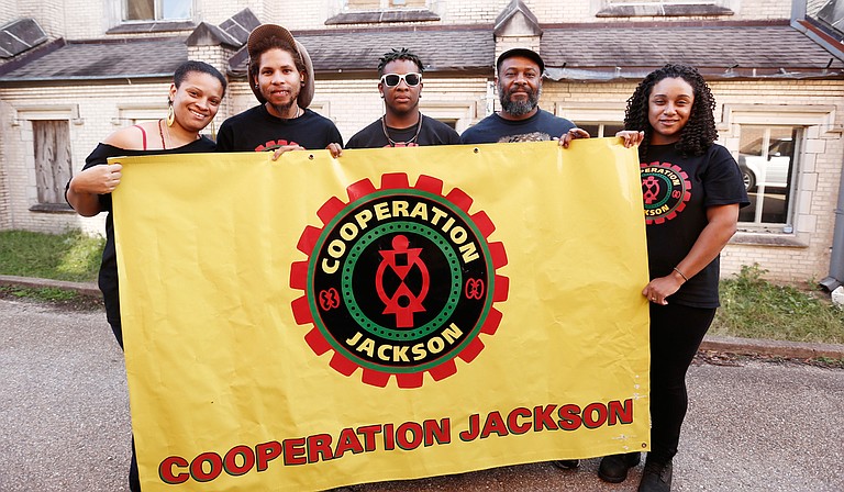 Sacajawea Hall, Brandon King, Elijah Williams, Kali Akuno and Fa’Seye Aina Gonzalez (left to right) are five members of a delegation Cooperation Jackson is sending to Paris for the upcoming COP21 Climate Conference.