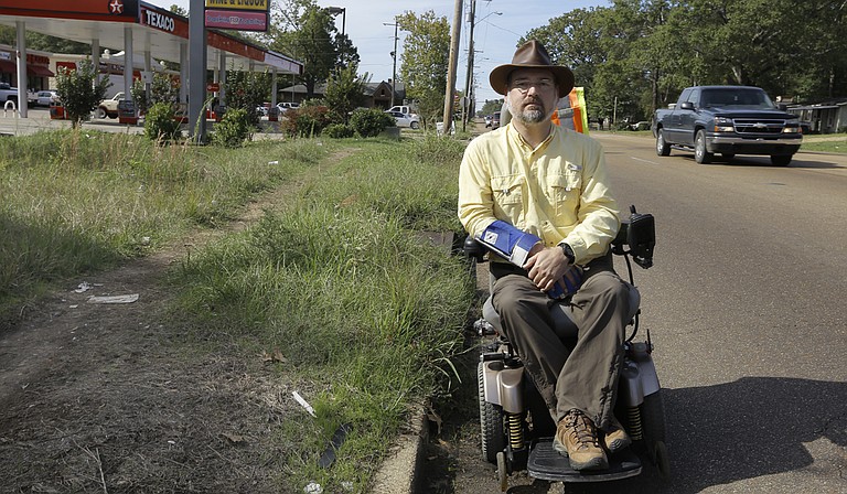 Scott Crawford says his Fondren neighborhood is full of danger for people in wheelchairs, those with visual impairments and gait disorders.