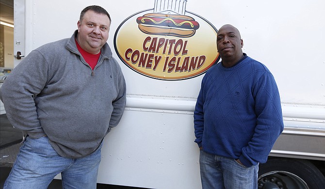 Rob Lehman (left) and Al Brown (right) began Capitol Coney Island earlier this year. Capitol Coney Island has dishes such as chili dogs. Photo courtesy Imani Khayyam/ Capitol Coney Island