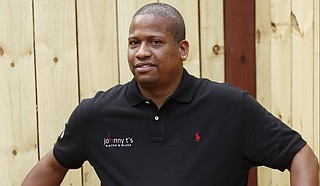 John Tierre, proprietor of Johnny T’s Bistro & Blues, says he already has to compete with surrounding bars whose so-called resort status allows them to remain open all night. A City plan to offer the status to the new Cathead Distillery but exclude existing venues could unite downtown competitors.