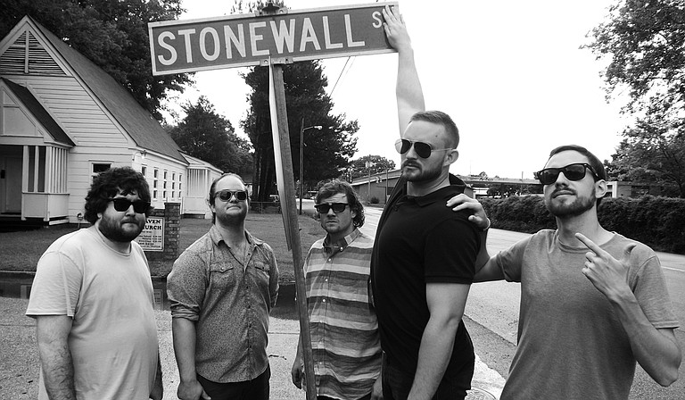 (Left to right) John David Harrison, Zac Clarke, Matthew Simonton, Andrew Brewer and Mitch Phillips of Stonewalls perform at Ole Tavern on George Street on Saturday, Jan. 23. Photo courtesy Corinthian Washington