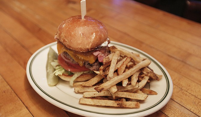 Fenian’s Pub’s new menu has dishes such as the Fenian’s burger.