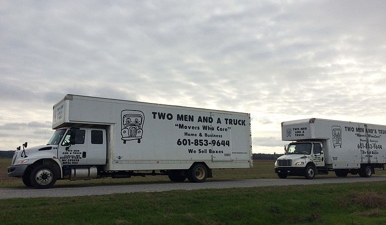 Two Men and a Truck started 30 years ago as an after-school business for two high-school boys, brothers Brig and Jon Sorber. Photo courtesy Facebook/Two Men and a Truck