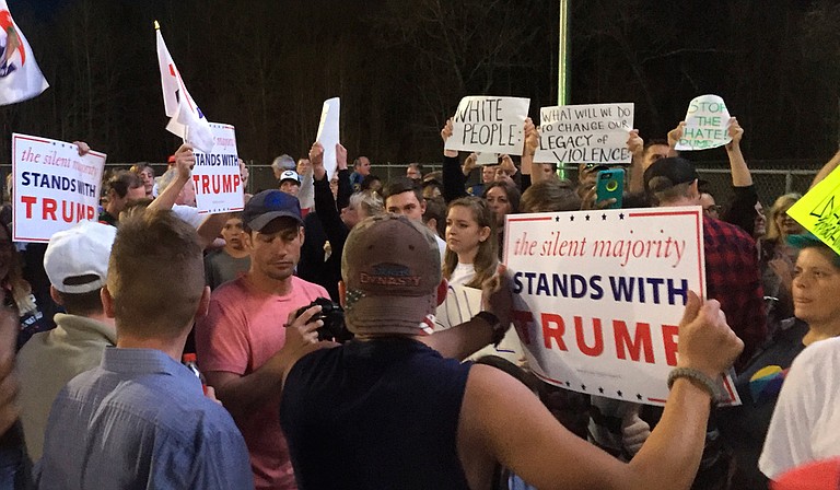 Young people outside Madison Central Monday night squared off over support of Donald Trump, and whether to keep talking about race. Photo courtesy Onelia Hawa