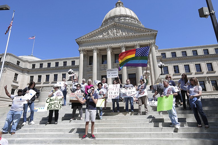 Protestors gather on the steps of the Capitol to rally against the passage of HB 1523, which would make discriminating against the LGBTQIA community legal.