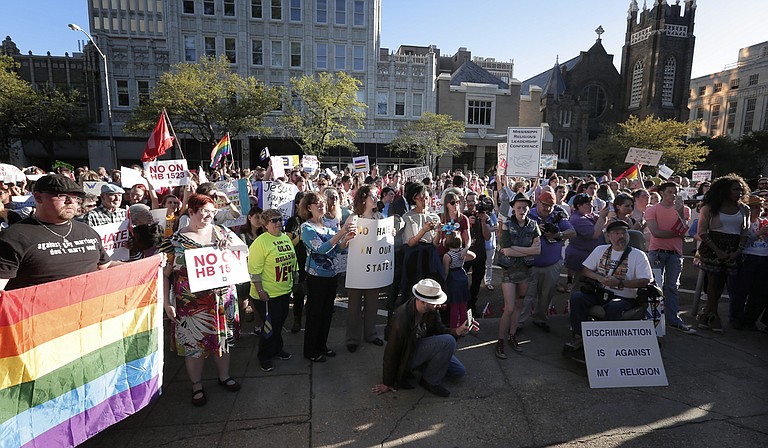 Protesters rallied against HB 1523 on Monday, April 4, outside Gov. Phil Bryant’s mansion, right after the House of Representatives sent the bill to the governor.