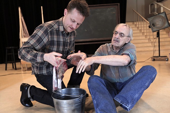 In New Stage Theatre’s “Red,” Cliff Miller (left) plays Ken, Mark Rothko’s assistant, and John Maxwell (right) plays Rothko.