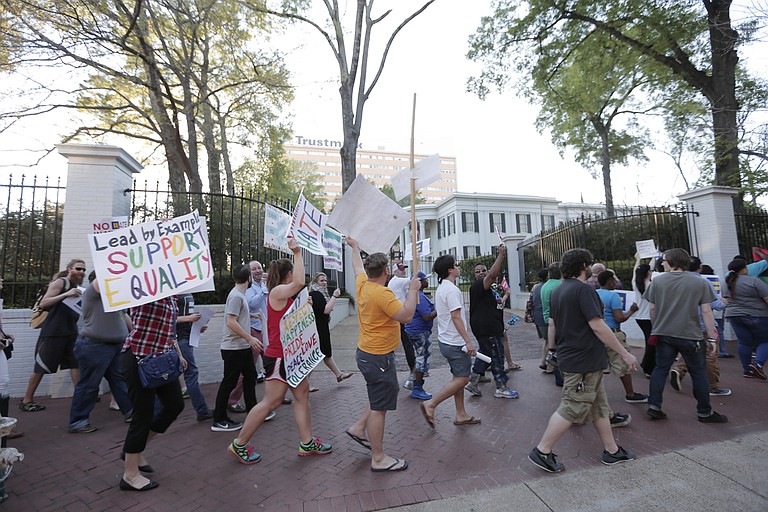 Protesters marched around Gov. Phil Bryant’s mansion in protest to House Bill 1523 on Monday,  April 4, a day before the governor signed the anti-LGBT bill into law.
