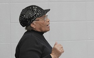 Alberta Epps inquired at the meeting about property next to her home, discovering the owner had back property taxes.