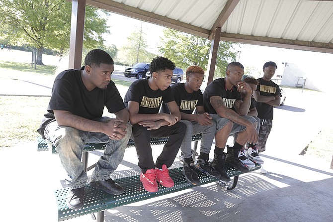 Several members of the “Undivided” crew told their story recently in Sheppards Park in the Washington Addition. From left: Monterius Griffin, Jordan Alexander, Steffon Butler, John Knight, Stephen Butler and Jay McChristian.