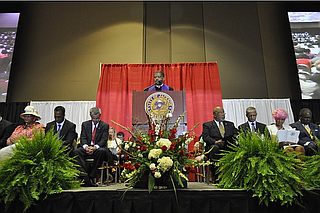 Former JMAA Commissioner Jeffery Stallworth filed the first lawsuit over the State's airport "takeover" law. He is pictured here in 2013. Chokwe Lumumba, who appointed him to the commission is also pictured, second to his left. File Photo