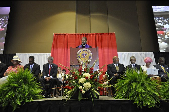 Former JMAA Commissioner Jeffery Stallworth filed the first lawsuit over the State's airport "takeover" law. He is pictured here in 2013. Chokwe Lumumba, who appointed him to the commission is also pictured, second to his left. File Photo