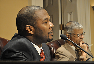 Synarus Green (left) was Mayor Chokwe Lumumba's chief administrative officer. Now he's running for the Mississippi Legislature. The late mayor is pictured on the right. 