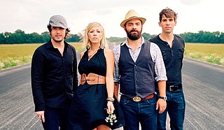 Nashville-based singer-songwriter Drew Holcomb (center right) and his band, the Neighbors (left: Rich Brinsfield; center left: Ellie Holcomb; right: Nathan Dugger), perform for the Stray at Home Art & Music Festival, Saturday, May 7, at Smith Park. Photo courtesy The Neighbors