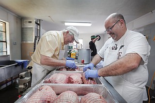 Chuck Odom (left) and John Tselepes (right)