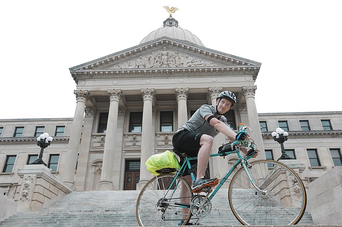 Hattiesburg native Benjamin Morris biked from Memphis to Jackson to hand-deliver the April 11 petition from 95 Mississippi writers opposing House Bill 1523 to Gov. Bryant's office.