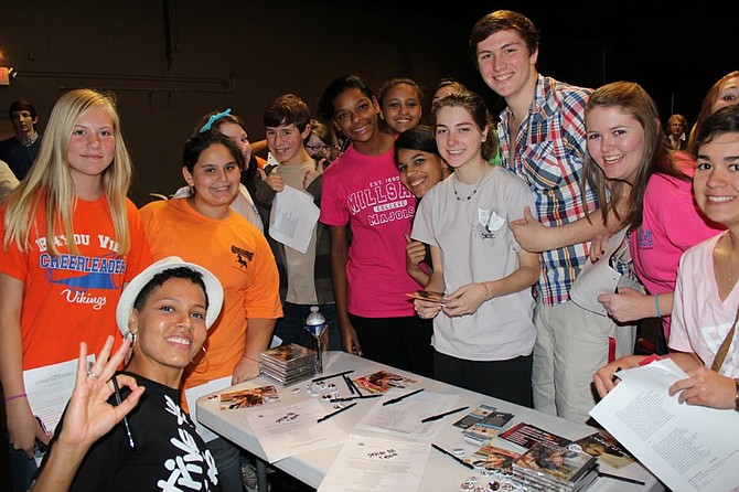 Hip-hop artist Genesis Be (bottom left) created Strive Till I Rise, which led hip-hop-infused youth workshops at locations in New York City and Mississippi. Photo courtesy Genesis Be