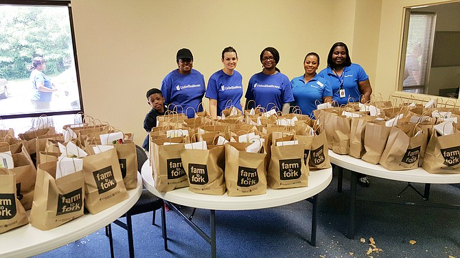 United Healthcare Community staff, which collaborated from the Mississippi and Tennessee health plans, help out with the Farm to Fork program, which helps Mississippi communities get farm-fresh produce. Photo courtesy Farm to Fork