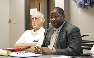 Johnnie McDaniels (right), executive director of the Hinds County Youth Court, said that patterns of repeat offenses are the result of “gaps” in the juvenile-justice system. Pictured to the left is retired counselor George Porter.