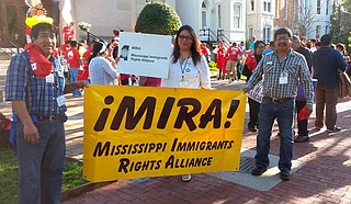 Jesus Mateos Ramirez (left), Melinda Medina (center) and Esequiel Gamboa (right) attend a rally for Immigrants Rights. Medina is the co-owner of the Gulf Coast Latino Services and a community organizer with MIRA. Photo courtesy Melinda Medina