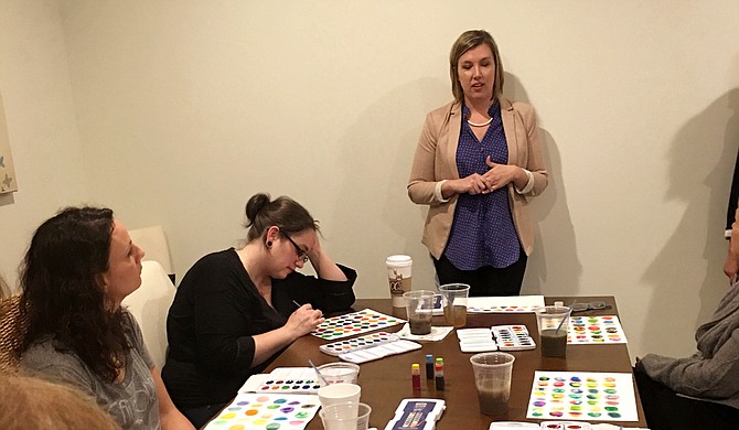 Earlier this year, counselor Megan Clapton and artist Ginger Williams Cook (pictured) partnered together for a workshop that combined mindfulness practices and watercolor painting. Photo courtesy Ginger Williams Cook