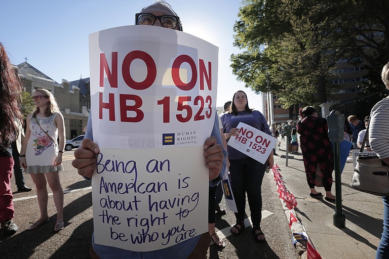 Protesters rallied against House Bill 1523 in April, which will become law on July 1 unless U.S. District Judge Carlton Reeves blocks it this week.
