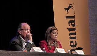Memphis-based Project Specialist Mike Mullis (left) and MDA Chief Marketing Officer Pamela Weaver (right) listen to audience questions at the June 21 Continental Tire town-hall meeting.