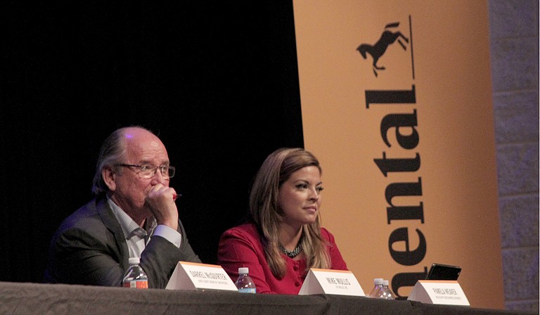 Memphis-based Project Specialist Mike Mullis (left) and MDA Chief Marketing Officer Pamela Weaver (right) listen to audience questions at the June 21 Continental Tire town-hall meeting.