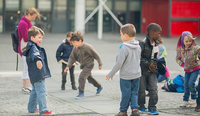 The Help Me Grow program will run through a hotline to connect families to educational and health services for youth throughout the state. Photo courtesy Flickr/Gatanass