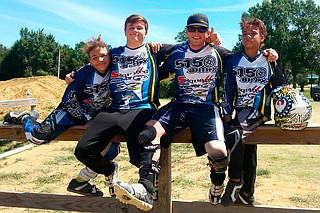 (left to right) Stone Trigg, Peyton Goddard, John Goddard and Blaze Trigg are on the 5150 BMX team at Magnolia Ridge BMX track. Photo courtesy Philip Homeburg