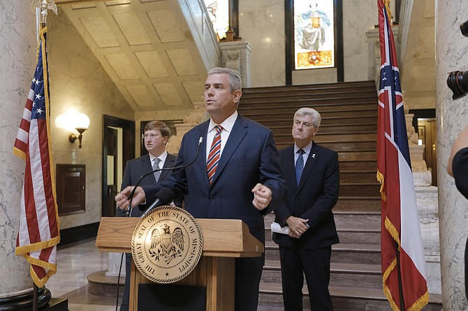 House Speaker Philip Gunn (center), Lt. Gov. Tate Reeves (left) and Gov. Phil Bryant (right) announced last week that working groups of legislators will look at individual state agency budgets as well as the state’s tax code.