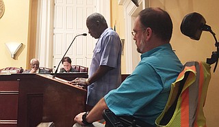 Dr. Scott Crawford waits his turn to speak to the Jackson City Council about accessibility for people with disabilities during the July 22 Planning Committee meeting.