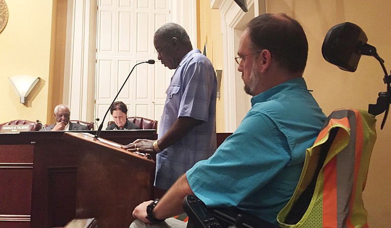 Dr. Scott Crawford waits his turn to speak to the Jackson City Council about accessibility for people with disabilities during the July 22 Planning Committee meeting.