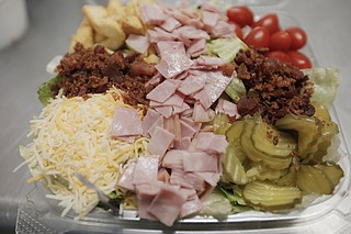 Ray’s Smokehouse and Grill serves dishes such as burgers and wings, as well as a Chef's Salad (pictured).
