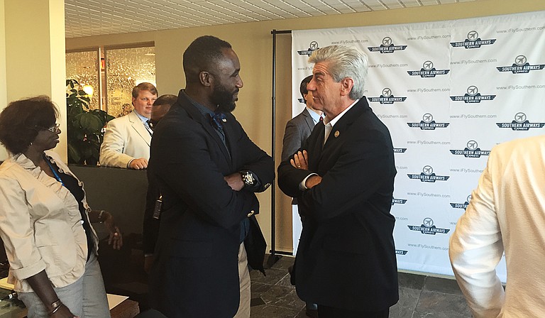 Jackson Mayor Tony Yarber (left) and Gov. Phil Bryant (right) both mentioned the "momentum" that the addition of a new air service to the Jackson-Medgar Wiley Evers International Airport means to the Jackson metro area.