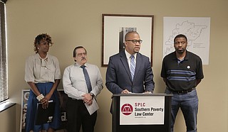 From left: Jackson Public Schools parents Cassandra Overton-Welchlin and Charles Araujo; attorney Jody Owens; and Mississippi NAACP president Derrick Johnson hope a judge will rule quickly on a lawsuit against the Mississippi charter-school law.