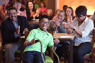 Jordan Morgan smiles as he is announced as the 2016-17 Children's Miracle Network Hospitals Champion for Mississippi on Wednesday in Clinton. Cheering him on are, from left, father Chris Morgan, grandmother Evelyn Morgan and mother Deborah Morgan. Photo Courtesy University of Mississippi Medical Center