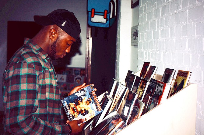 Jackson hip-hop artist devMaccc is an official brand manager for record, comic and collectibles store Offbeat in midtown. Photo courtesy Jamarcus Easterling