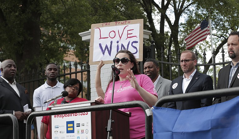 Felicia Brown-Williams (center), the public policy director at Planned Parenthood Southeast, said she knew a federal-court challenge would strike down a new State law targeting the clinic.