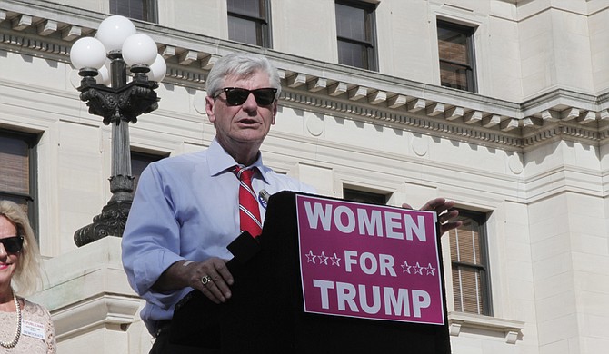 Gov. Phil Bryant opposes abortion even if it would save the mother’s life. He supports Donald Trump, who pledges to criminalize it.