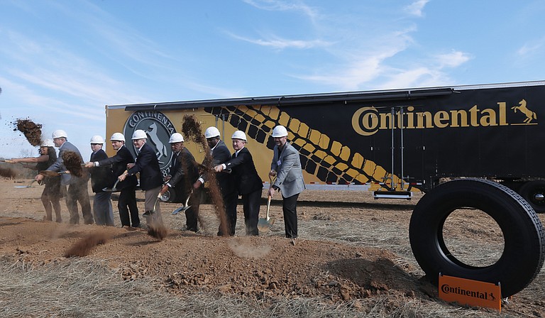Lawmakers, the governor, Continental executives and break ground on the site of the Continental tire plant outside of Clinton in Hinds County on Nov. 3.