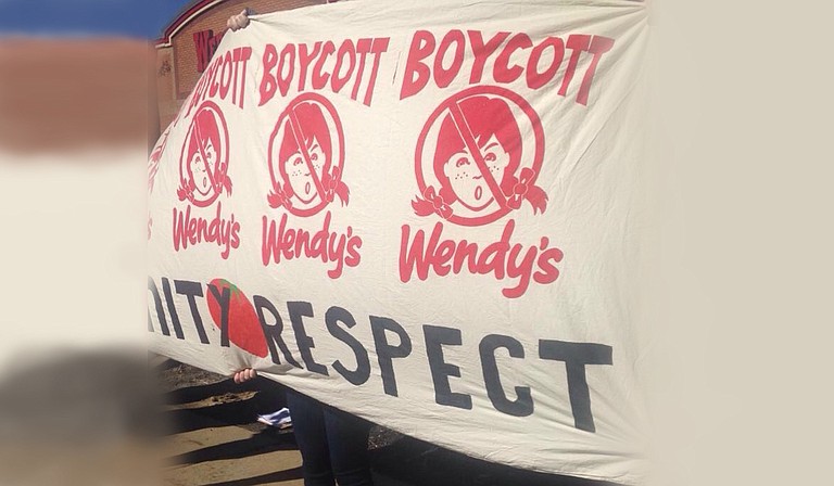 Protesters gathered at a local Wendy's this weekend to protest the restaurant for not participating in the Fair Food Program.