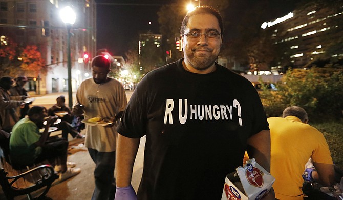 Bilal Qizilbash heads R U Hungry?, a local group that gathers food and items such as blankets to give to homeless individuals in Smith Park in downtown Jackson on Fridays.